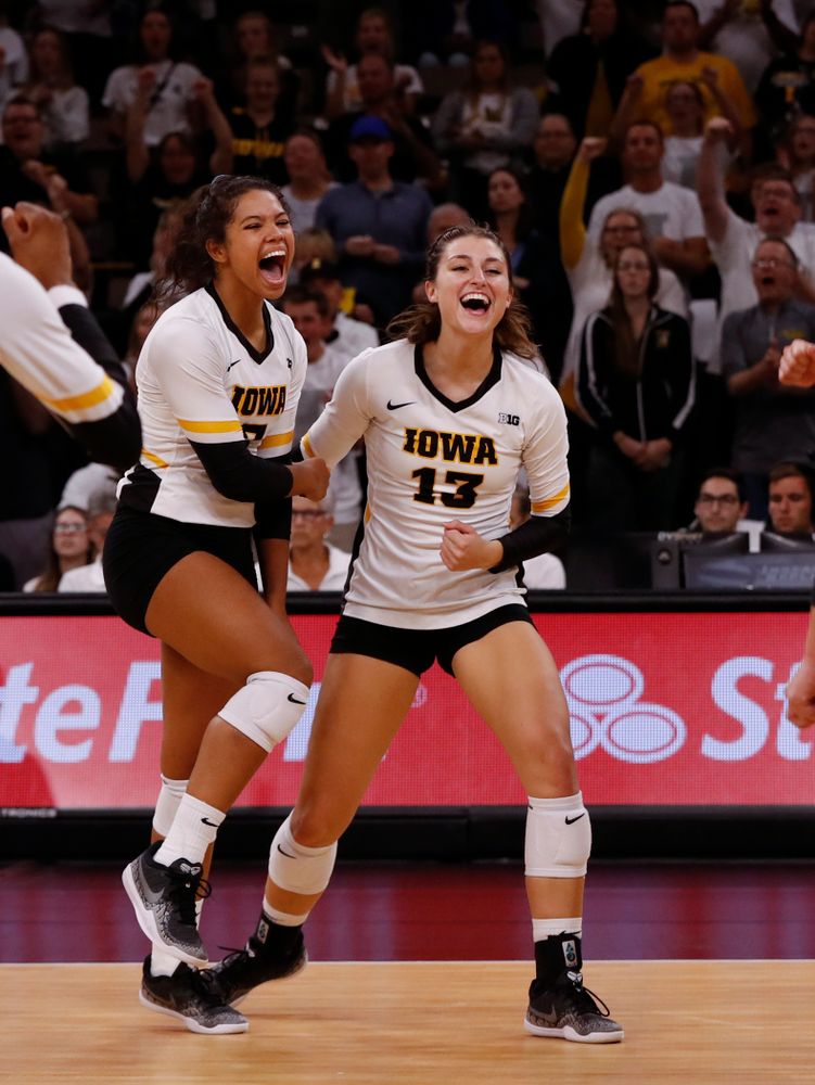 Iowa Hawkeyes setter Gabrielle Orr (7) and middle blocker Sarah Wing (13) against the Michigan State Spartans Friday, September 21, 2018 at Carver-Hawkeye Arena. (Brian Ray/hawkeyesports.com)