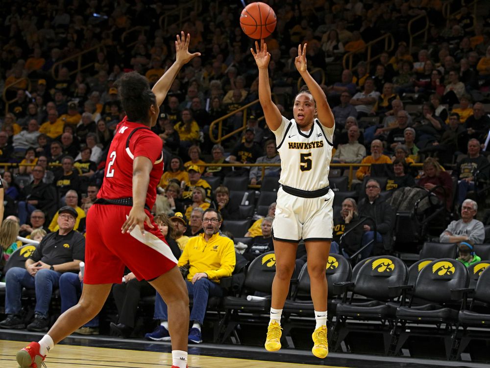 Iowa Hawkeyes guard Alexis Sevillian (5) makes a 3-pointer during the second quarter of the game at Carver-Hawkeye Arena in Iowa City on Thursday, February 6, 2020. (Stephen Mally/hawkeyesports.com)