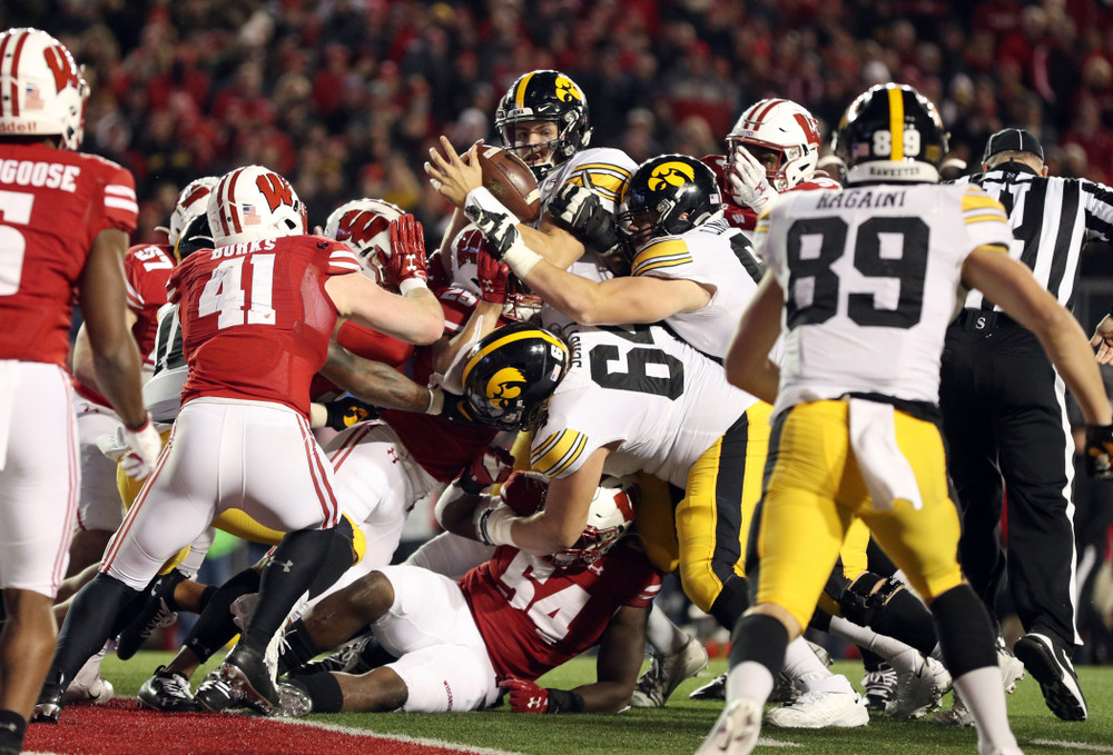 Iowa Hawkeyes quarterback Nate Stanley (4) against the Wisconsin Badgers Saturday, November 9, 2019 at Camp Randall Stadium in Madison, Wisc. (Brian Ray/hawkeyesports.com)