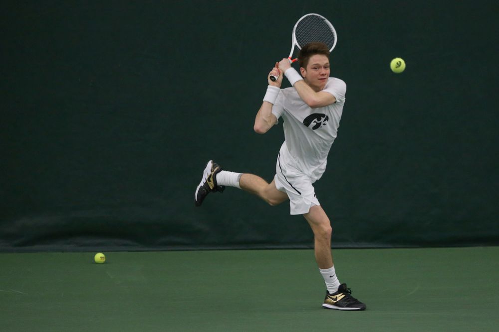 Iowa’s Jason Kerst returns a hit during the Iowa men’s tennis meet vs Nebraska on Sunday, March 1, 2020 at the Hawkeye Tennis and Recreation Complex. (Lily Smith/hawkeyesports.com)