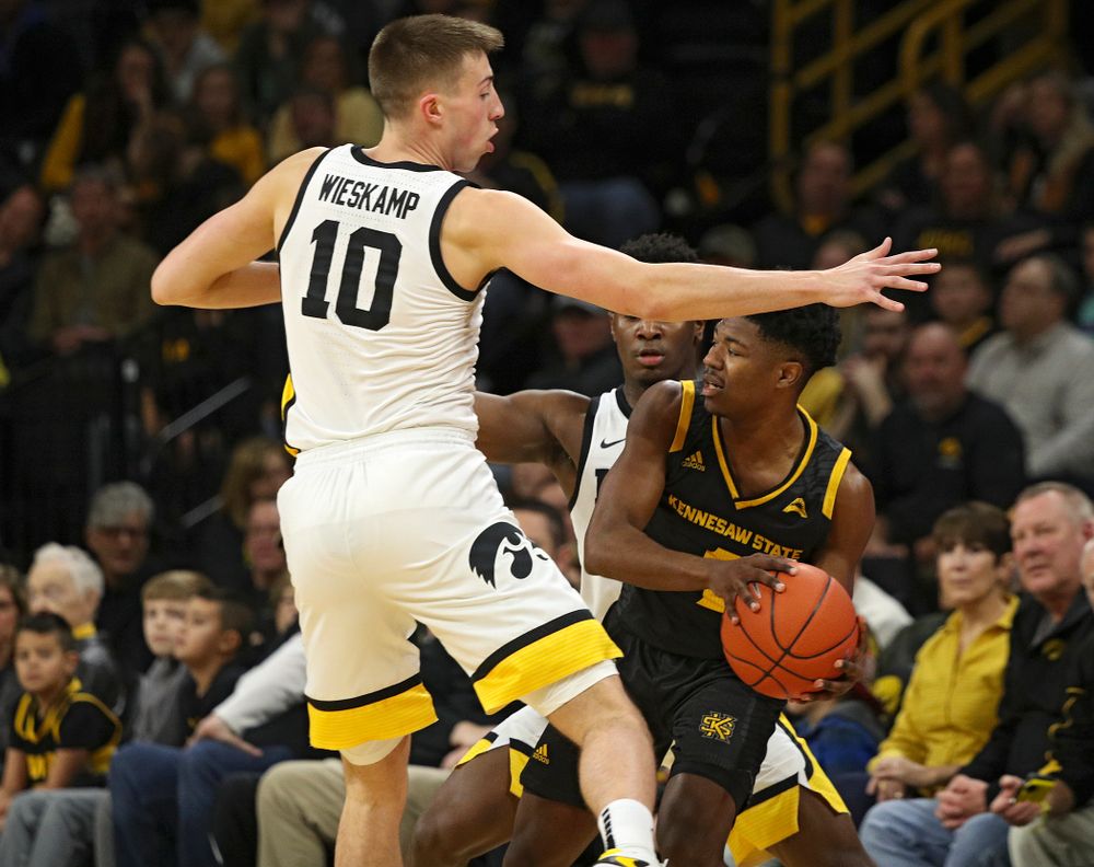 Iowa Hawkeyes guard Joe Wieskamp (10) and guard Joe Toussaint (1) pressure Kennesaw State Owls guard Terrell Burden (1) which leads to a turnover during the first half of their their game at Carver-Hawkeye Arena in Iowa City on Sunday, December 29, 2019. (Stephen Mally/hawkeyesports.com)