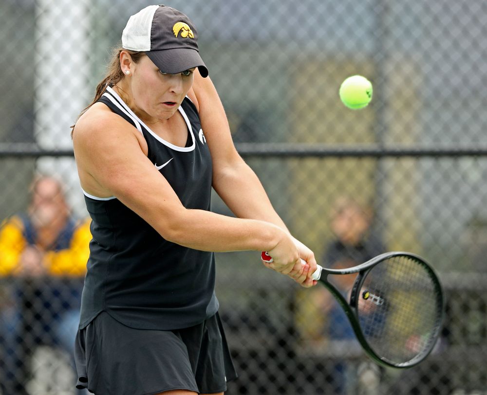 Iowa's Danielle Bauers returns a shot during their doubles match against Rutgers at the Hawkeye Tennis and Recreation Complex in Iowa City on Friday, Apr. 5, 2019. (Stephen Mally/hawkeyesports.com)