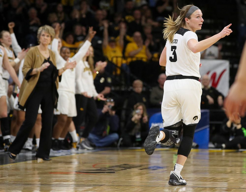 Iowa Hawkeyes guard Makenzie Meyer (3) points at a teammate after making a 3-pointer during the first round of the 2019 NCAA Women's Basketball Tournament at Carver Hawkeye Arena in Iowa City on Friday, Mar. 22, 2019. (Stephen Mally for hawkeyesports.com)