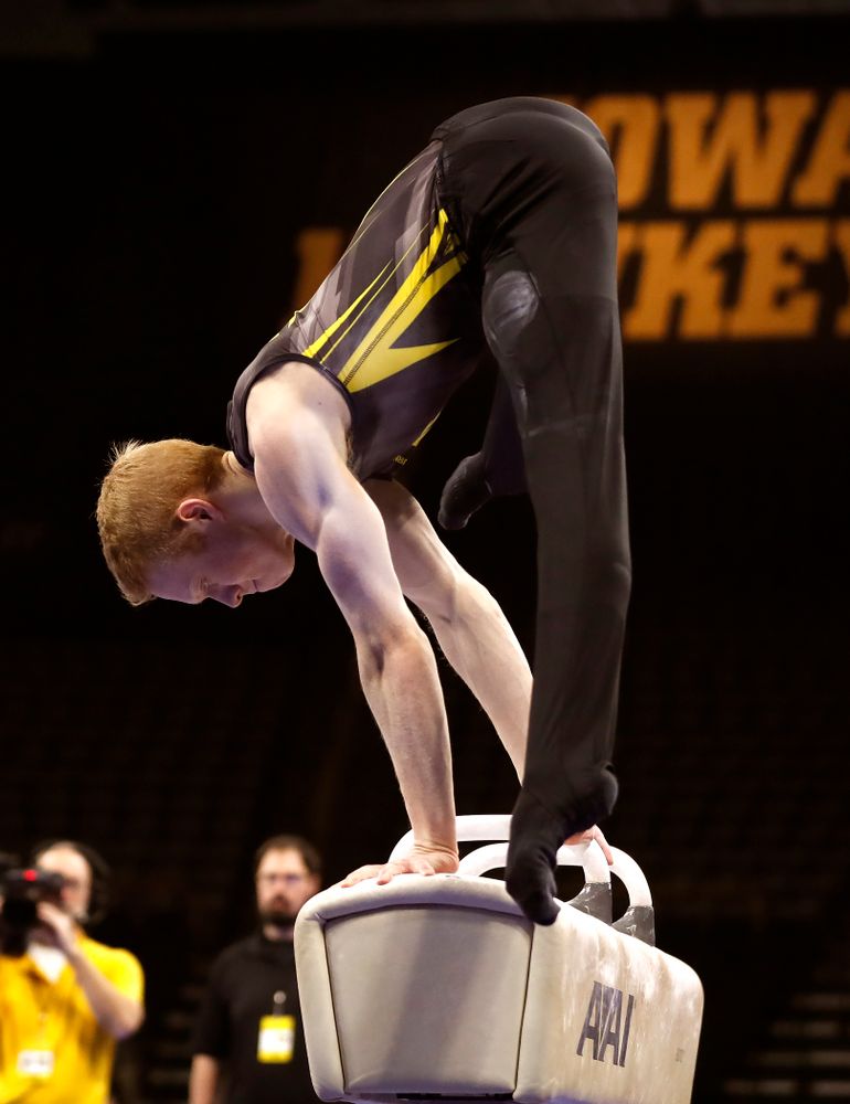 Nick Merryman competes on the pommel horse against Illinois 