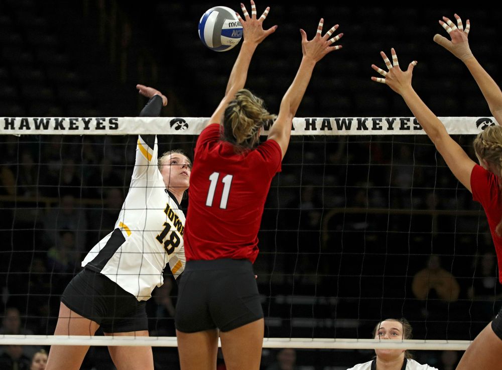 Iowa’s Hannah Clayton (18) goes up for a kill during the first set of their match against Nebraska at Carver-Hawkeye Arena in Iowa City on Saturday, Nov 9, 2019. (Stephen Mally/hawkeyesports.com)