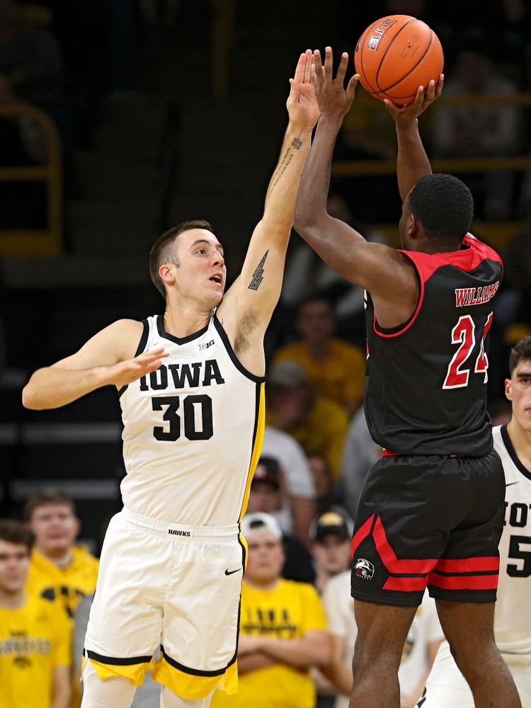 Iowa Hawkeyes guard Connor McCaffery (30) defends during the second half of their game at Carver-Hawkeye Arena in Iowa City on Friday, Nov 8, 2019. (Stephen Mally/hawkeyesports.com)