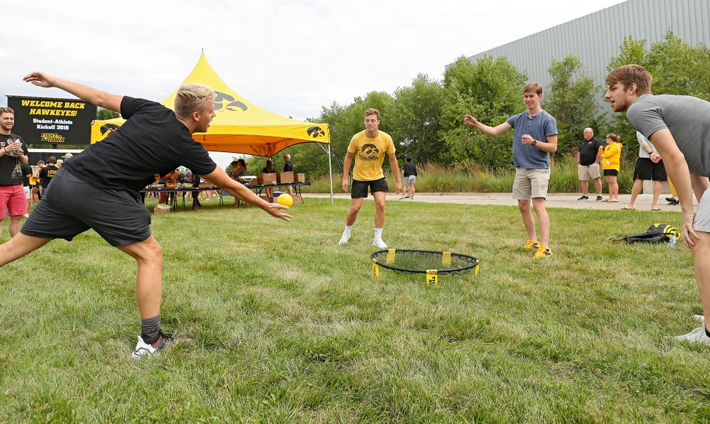Student-athletes play Spike Ball during the Student-Athlete Kickoff outside the Karro Athletics Hall of Fame Building in Iowa City on Sunday, Aug 25, 2019. (Stephen Mally/hawkeyesports.com)
