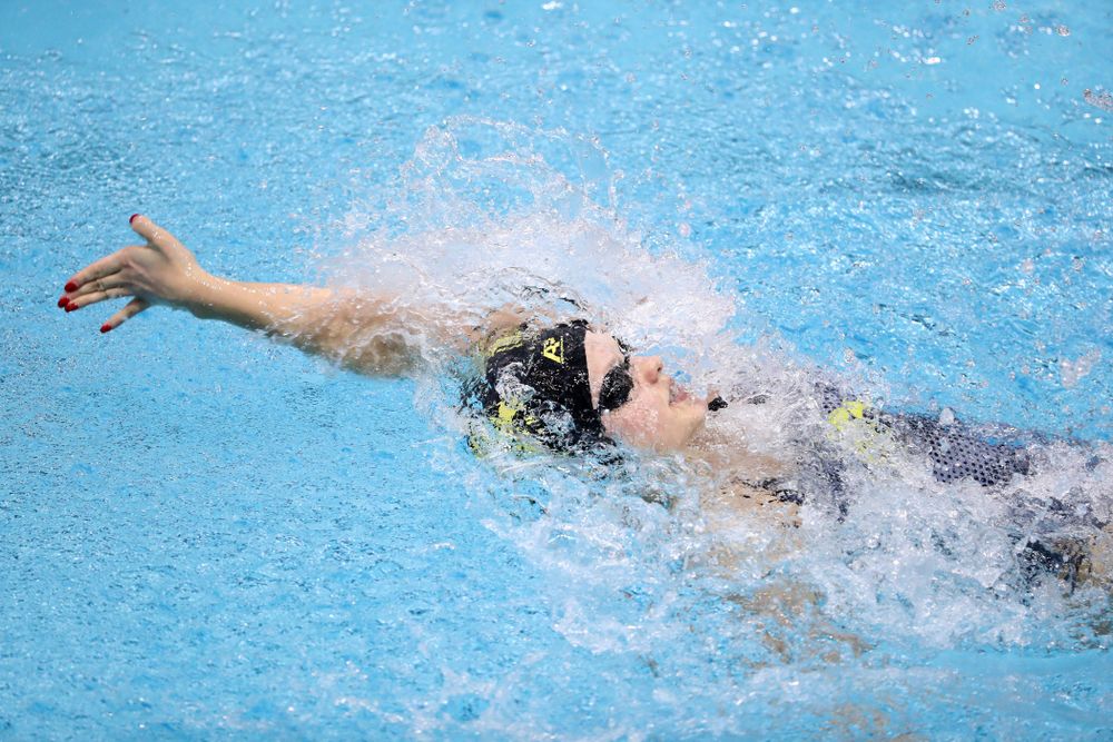 IowaÕs Julia Koluch swims the backstroke leg of the 200 Medley Relay against Notre Dame and Illinois Saturday, January 11, 2020 at the Campus Recreation and Wellness Center.  (Brian Ray/hawkeyesports.com)