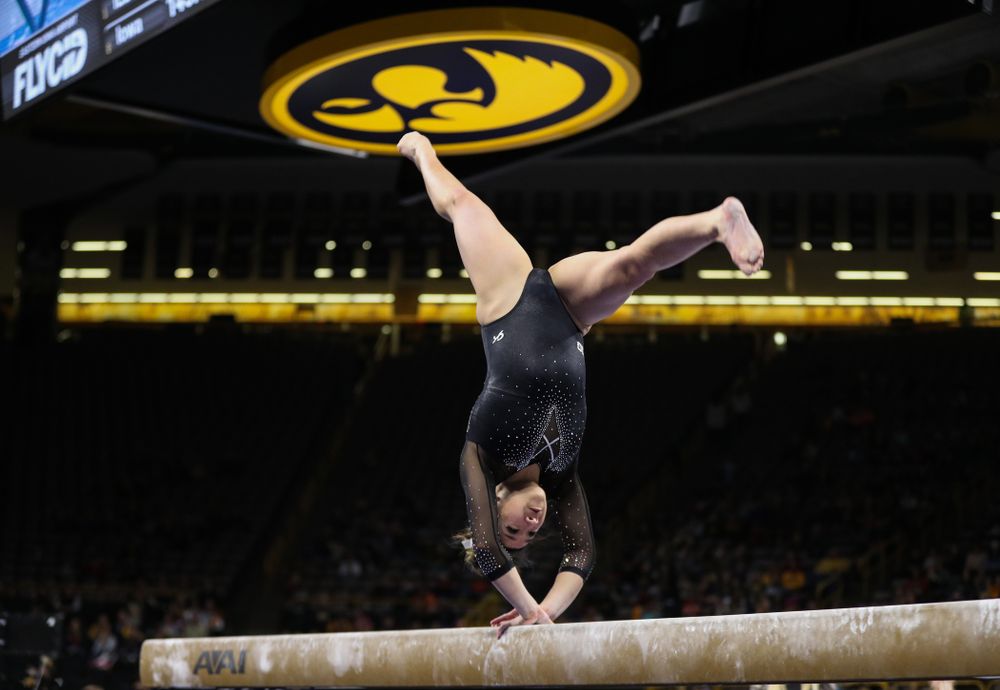 Iowa's Nicole Chow competes on the beem against Illinois Saturday, February 16, 2019 at Carver-Hawkeye Arena. (Brian Ray/hawkeyesports.com)