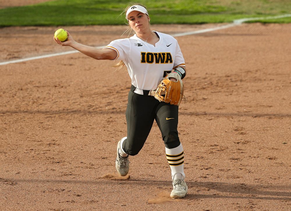 Iowa third baseman Sydney Owens (5) throws to first for an out during the third inning of their game against Ohio State at Pearl Field in Iowa City on Friday, May. 3, 2019. (Stephen Mally/hawkeyesports.com)