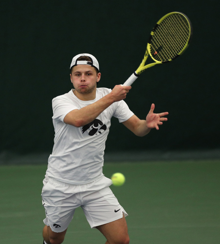 Iowa’s Will Davies against Cornell Sunday, March 8, 2020 at the Hawkeye Tennis and Recreation Center. (Brian Ray/hawkeyesports.com)