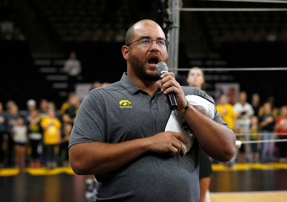 Former Hawkeye Football player Julian Vandervelde sings the National Anthem before the Iowa Hawkeyes game against the Michigan Wolverines Sunday, September 23, 2018 at Carver-Hawkeye Arena. (Brian Ray/hawkeyesports.com)