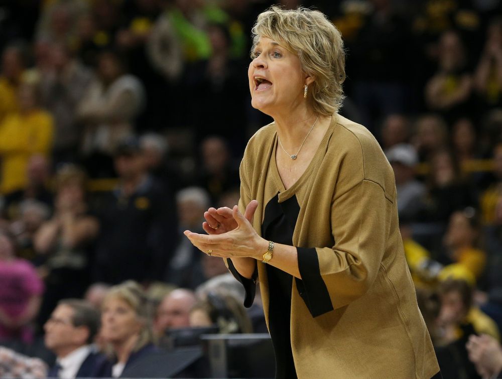 Iowa Hawkeyes head coach Lisa Bluder communicates with her team during the first round of the 2019 NCAA Women's Basketball Tournament at Carver Hawkeye Arena in Iowa City on Friday, Mar. 22, 2019. (Stephen Mally for hawkeyesports.com)