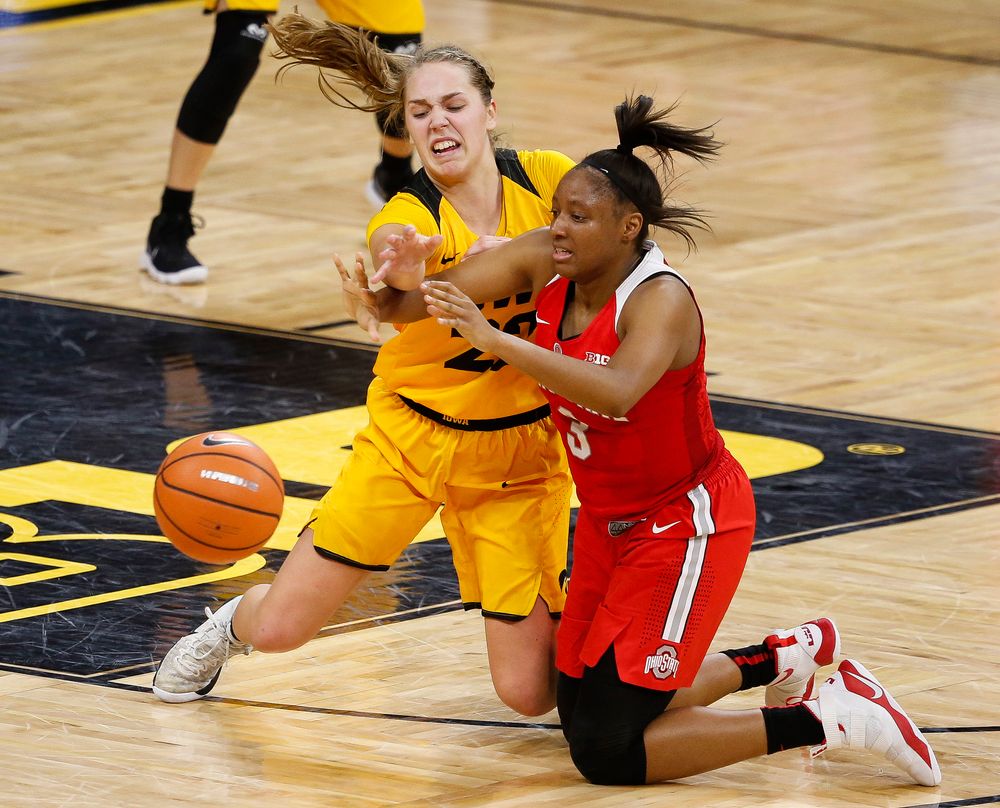 Iowa Hawkeyes guard Kathleen Doyle (22) defends Ohio State Buckeyes guard Kelsey Mitchell (3) during a game at Carver-Hawkeye Arena on January 25, 2018. (Tork Mason/hawkeyesports.com)
