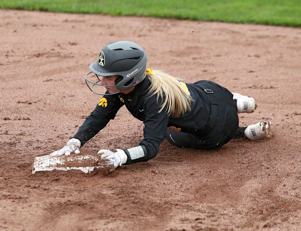 Iowa infielder Taylor Ryan (28) steals second base during the sixth inning of their game against Iowa Softball vs Indian Hills Community College at Pearl Field in Iowa City on Sunday, Oct 6, 2019. (Stephen Mally/hawkeyesports.com)