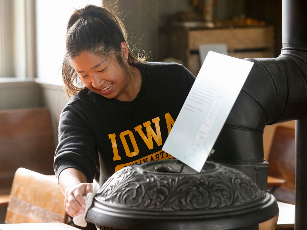 Iowa women's gymnasts clean the 1876 Coralville Schoolhouse during the 21st annual ISAAC Hawkeye Day of Caring in Coralville on Sunday, Apr. 28, 2019. (Stephen Mally/hawkeyesports.com)