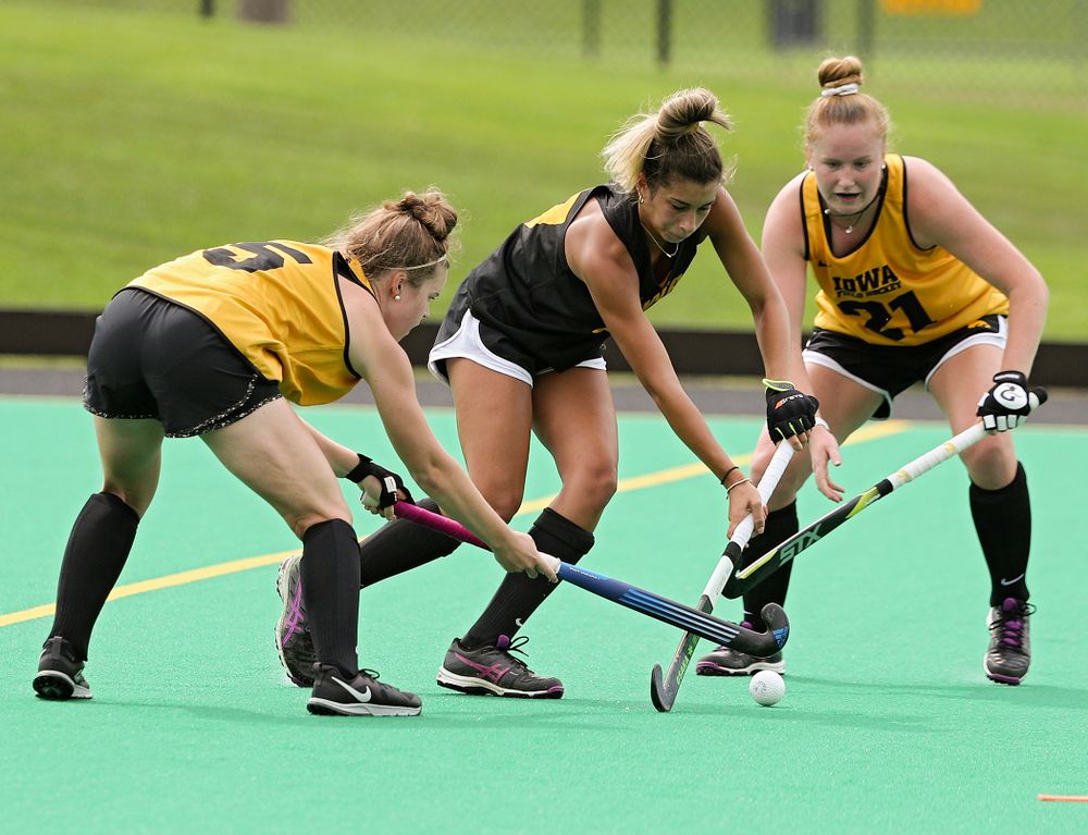 Iowa’s Meghan Conroy (5), Ciara Smith (17), and Makenna Maguire (21) run a drill during practice at Grant Field in Iowa City on Thursday, Aug 15, 2019. (Stephen Mally/hawkeyesports.com)