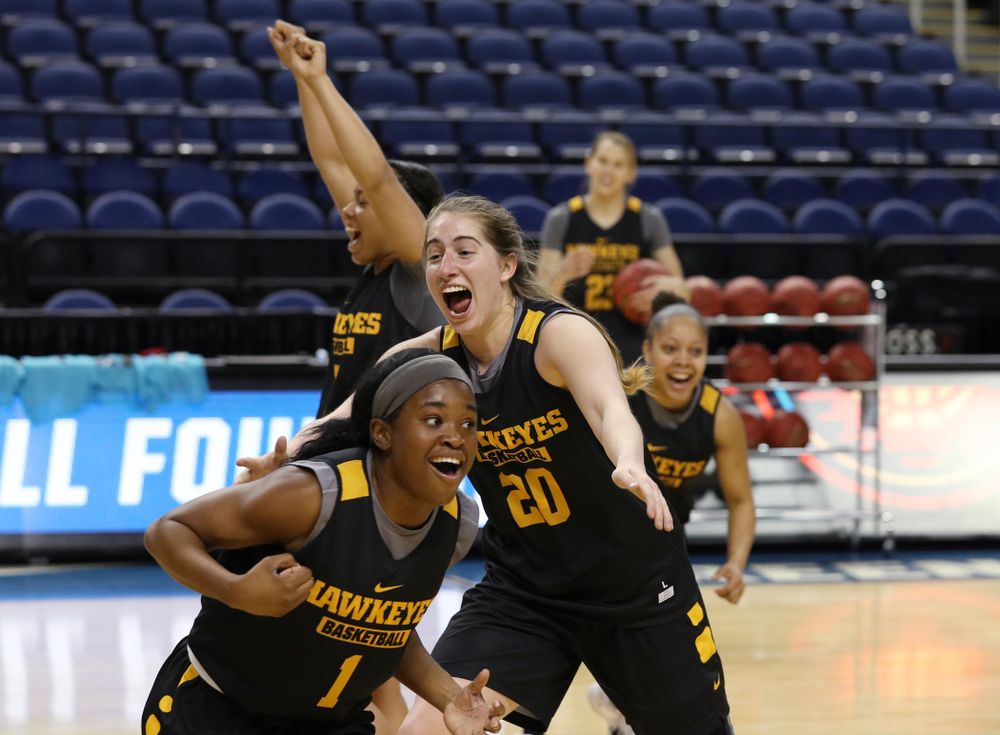 Iowa Hawkeyes guard Kate Martin (20) and guard Tomi Taiwo (1) during media and practice as they prepare for their Sweet 16 matchup against NC State Friday, March 29, 2019 at the Greensboro Coliseum in Greensboro, NC.(Brian Ray/hawkeyesports.com)