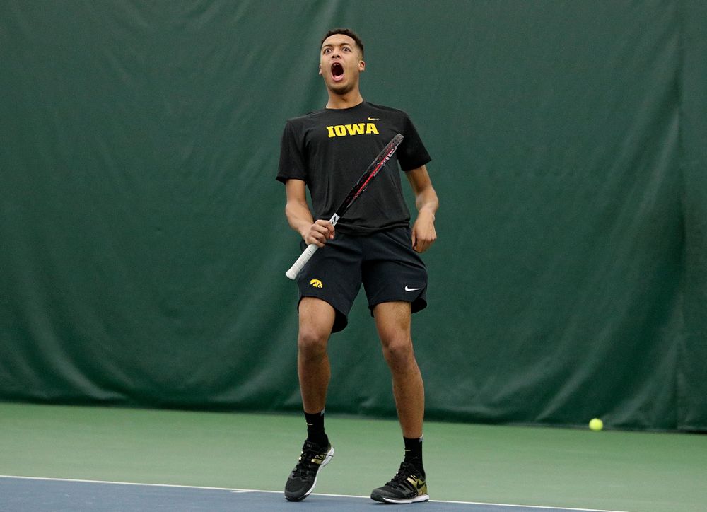 Iowa’s Oliver Okonkwo celebrates during his doubles match at the Hawkeye Tennis and Recreation Complex in Iowa City on Thursday, January 16, 2020. (Stephen Mally/hawkeyesports.com)