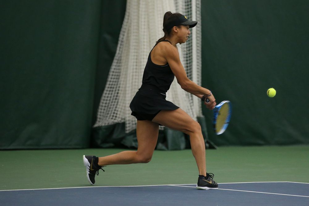 Iowa’s Michelle Bacalla returns a ball during the Iowa women’s tennis meet vs UNI  on Saturday, February 29, 2020 at the Hawkeye Tennis and Recreation Complex. (Lily Smith/hawkeyesports.com)