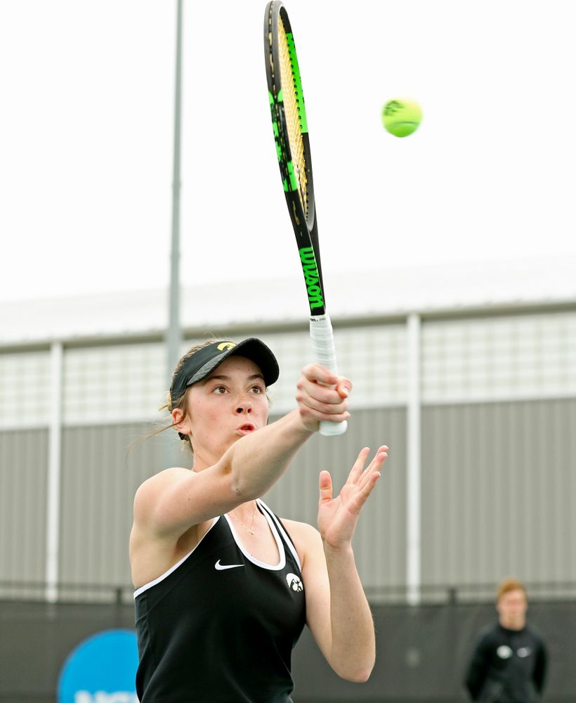 Iowa's Samantha Mannix returns a shot during their doubles match against Rutgers at the Hawkeye Tennis and Recreation Complex in Iowa City on Friday, Apr. 5, 2019. (Stephen Mally/hawkeyesports.com)