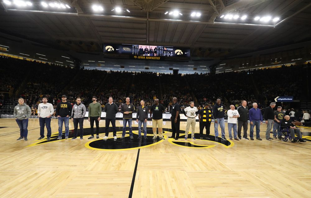 Former Iowa Hawkeye letterman are recognized during half-time against the Ohio State Buckeyes Saturday, January 12, 2019 at Carver-Hawkeye Arena. (Brian Ray/hawkeyesports.com)