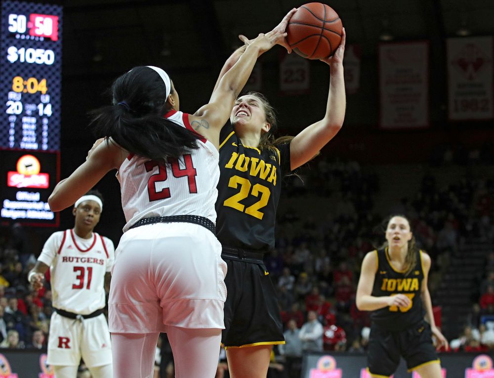 Iowa guard Kathleen Doyle (22) makes a basket during the second quarter of their game at the Rutgers Athletic Center in Piscataway, N.J. on Sunday, March 1, 2020. (Stephen Mally/hawkeyesports.com)