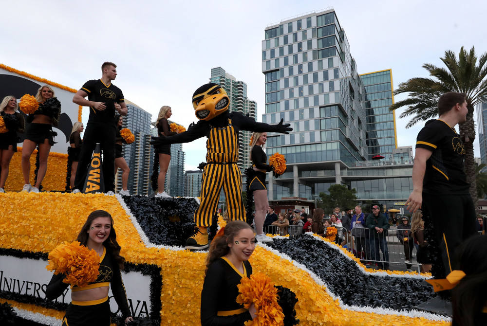 The Hawkeye Marching Band and the Iowa Spirit Squad march in the Holiday Bowl Parade Thursday, December 26, 2019 in San Diego. (Brian Ray/hawkeyesports.com)