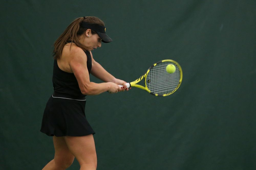 Iowa’s Danielle Bauers returns a ball during the Iowa women’s tennis meet vs UNI  on Saturday, February 29, 2020 at the Hawkeye Tennis and Recreation Complex. (Lily Smith/hawkeyesports.com)