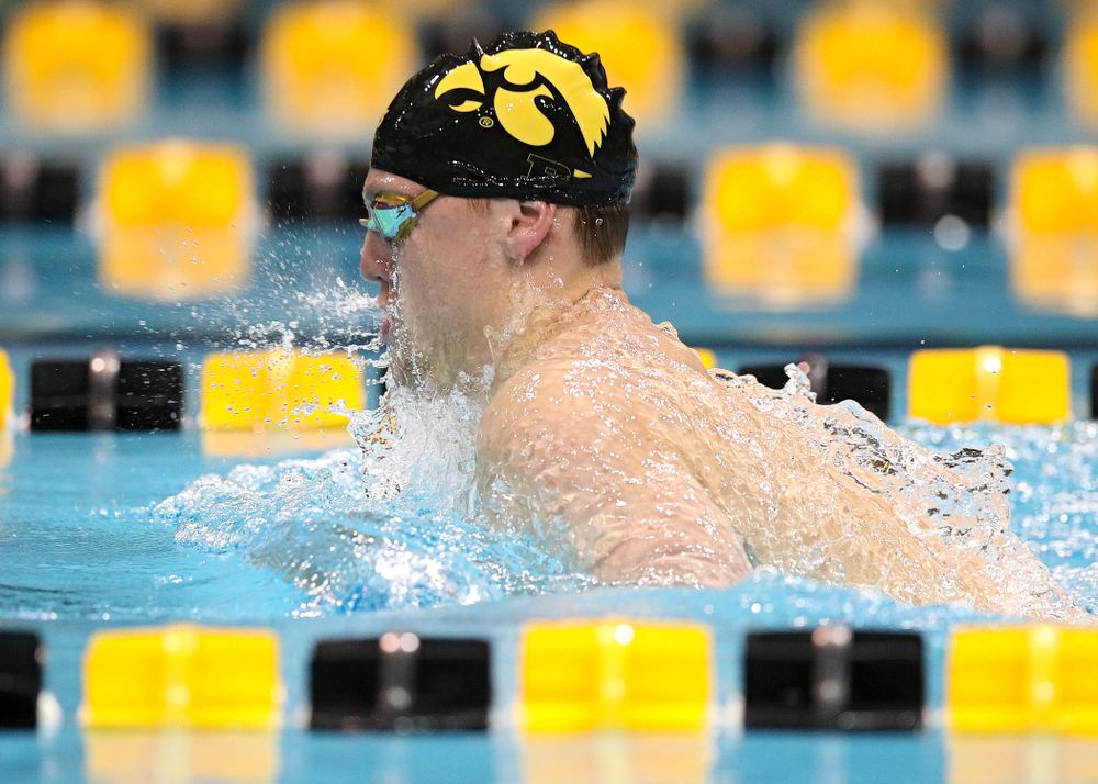 Iowa’s Ryan Purdy swims the men’s 100 yard breaststroke event during their meet at the Campus Recreation and Wellness Center in Iowa City on Friday, February 7, 2020. (Stephen Mally/hawkeyesports.com)