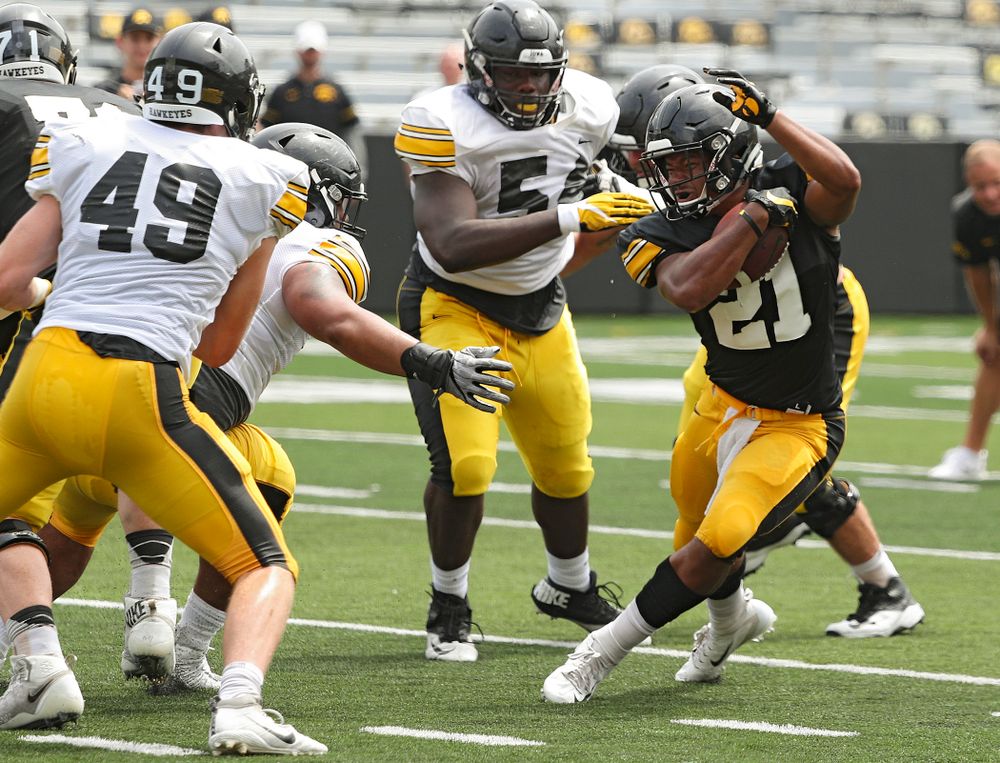 Iowa Hawkeyes running back Ivory Kelly-Martin (21) makes a cut on a run during Fall Camp Practice No. 8 at Kids Day at Kinnick Stadium in Iowa City on Saturday, Aug 10, 2019. (Stephen Mally/hawkeyesports.com)