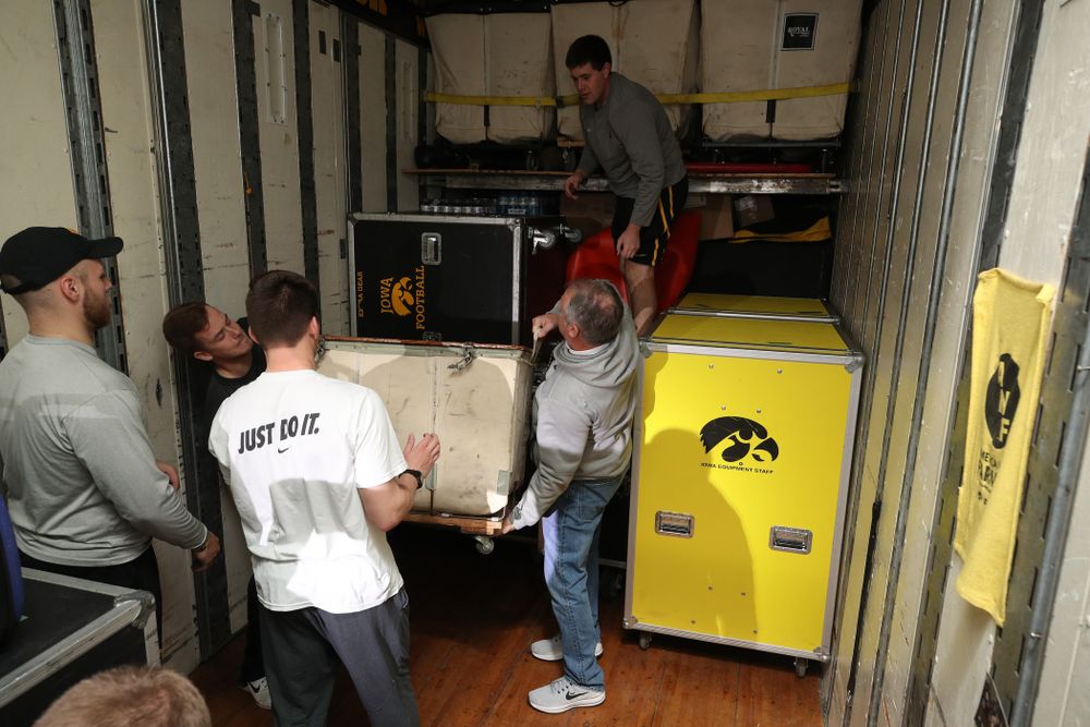 Members fo the Hawkeye Football equipment staff and managers load equipment onto the truck bound for Tampa for the Outback Bowl Wednesday, December 19, 2018 at the Hansen Football Performance Center.  (Brian Ray/hawkeyesports.com)