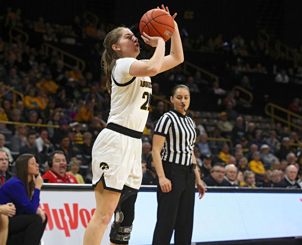 Iowa Hawkeyes guard Kate Martin (20) makes a 3-pointer during the second quarter of the game at Carver-Hawkeye Arena in Iowa City on Thursday, February 6, 2020. (Stephen Mally/hawkeyesports.com)