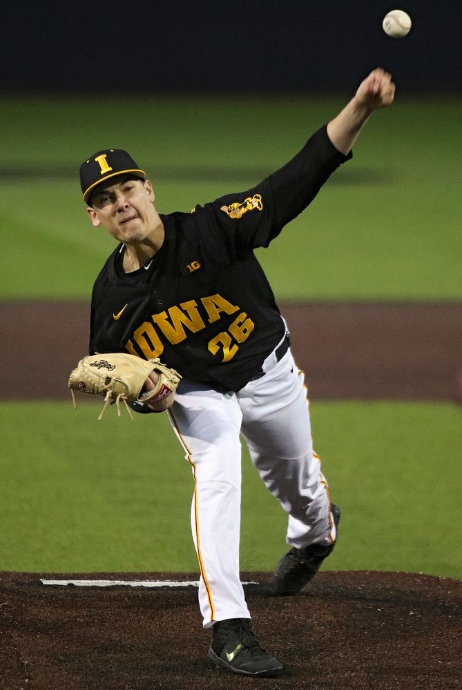 Iowa pitcher Adam Ketelsen (26) delivers to the plate during the seventh inning of their game at Duane Banks Field in Iowa City on Tuesday, March 3, 2020. (Stephen Mally/hawkeyesports.com)