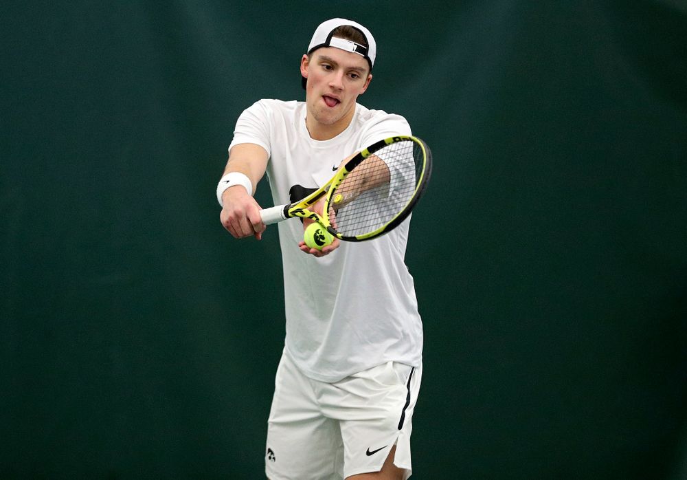 Iowa’s Joe Tyler serves during his singles match at the Hawkeye Tennis and Recreation Complex in Iowa City on Sunday, February 16, 2020. (Stephen Mally/hawkeyesports.com)
