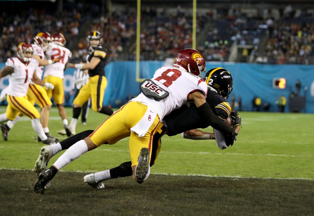 Iowa Hawkeyes wide receiver Brandon Smith (12) catches a touchdown pass against USC in the Holiday Bowl Friday, December 27, 2019 at San Diego Community Credit Union Stadium.  (Brian Ray/hawkeyesports.com)