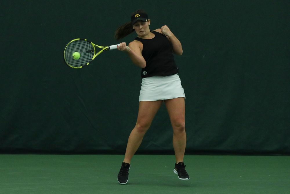 Iowa’s Danielle Bauers returns a hit during the Iowa women’s tennis meet vs DePaul  on Friday, February 21, 2020 at the Hawkeye Tennis and Recreation Complex. (Lily Smith/hawkeyesports.com)
