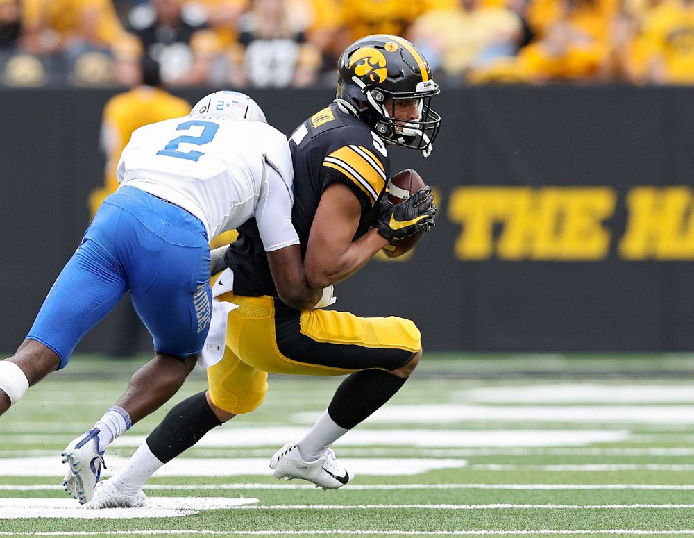 Iowa Hawkeyes wide receiver Oliver Martin (5) pulls in a pass during fourth quarter of their game at Kinnick Stadium in Iowa City on Saturday, Sep 28, 2019. (Stephen Mally/hawkeyesports.com)