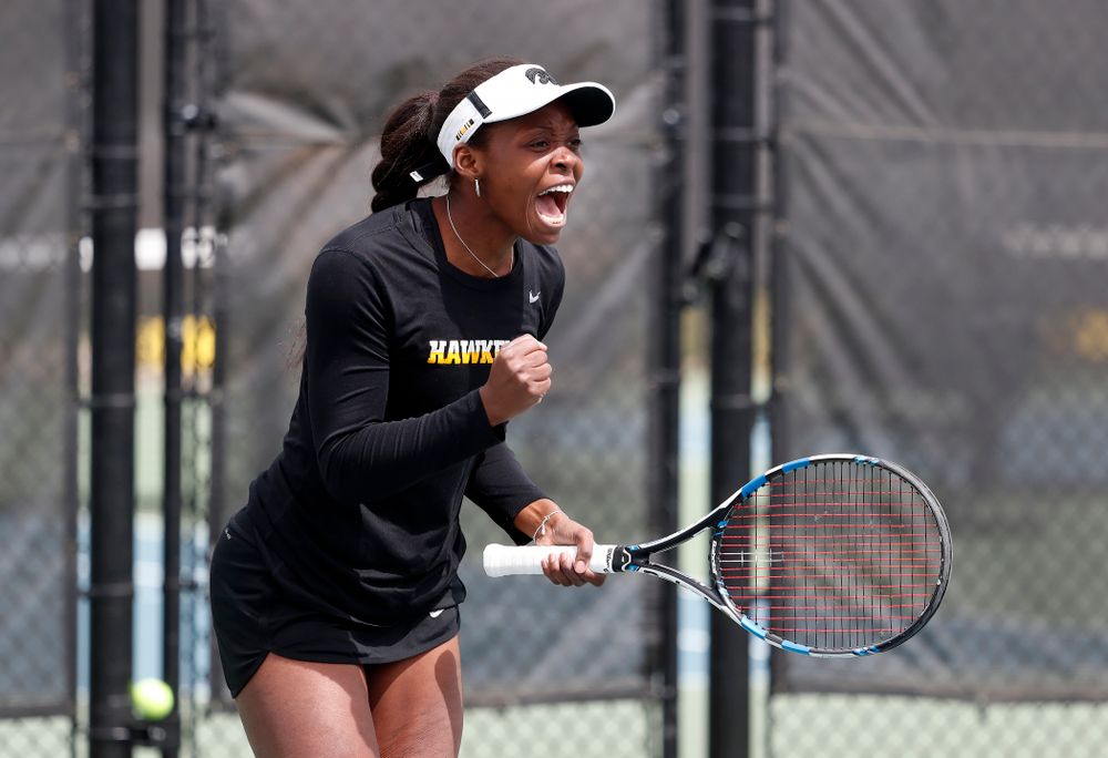 Adorabol Huckleby and Zoe Douglas play a doubles match against the Wisconsin Badgers Sunday, April 22, 2018 at the Hawkeye Tennis and Recreation Center. (Brian Ray/hawkeyesports.com)