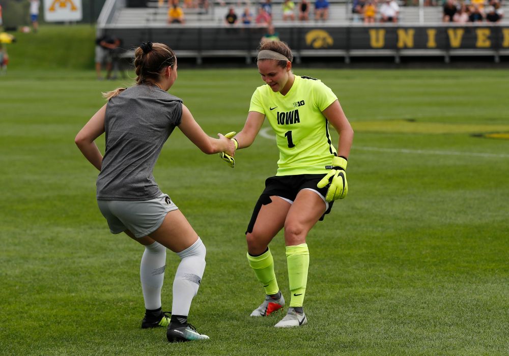 Iowa Hawkeyes Claire Graves (1) and  Karson Rauch (9) against Indiana State Sunday, August 26, 2018 at the Iowa Soccer Complex. (Brian Ray/hawkeyesports.com)