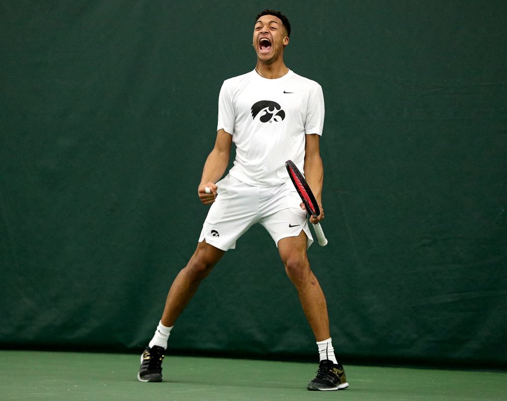 Iowa’s Oliver Okonkwo celebrates during his singles match at the Hawkeye Tennis and Recreation Complex in Iowa City on Sunday, February 16, 2020. (Stephen Mally/hawkeyesports.com)