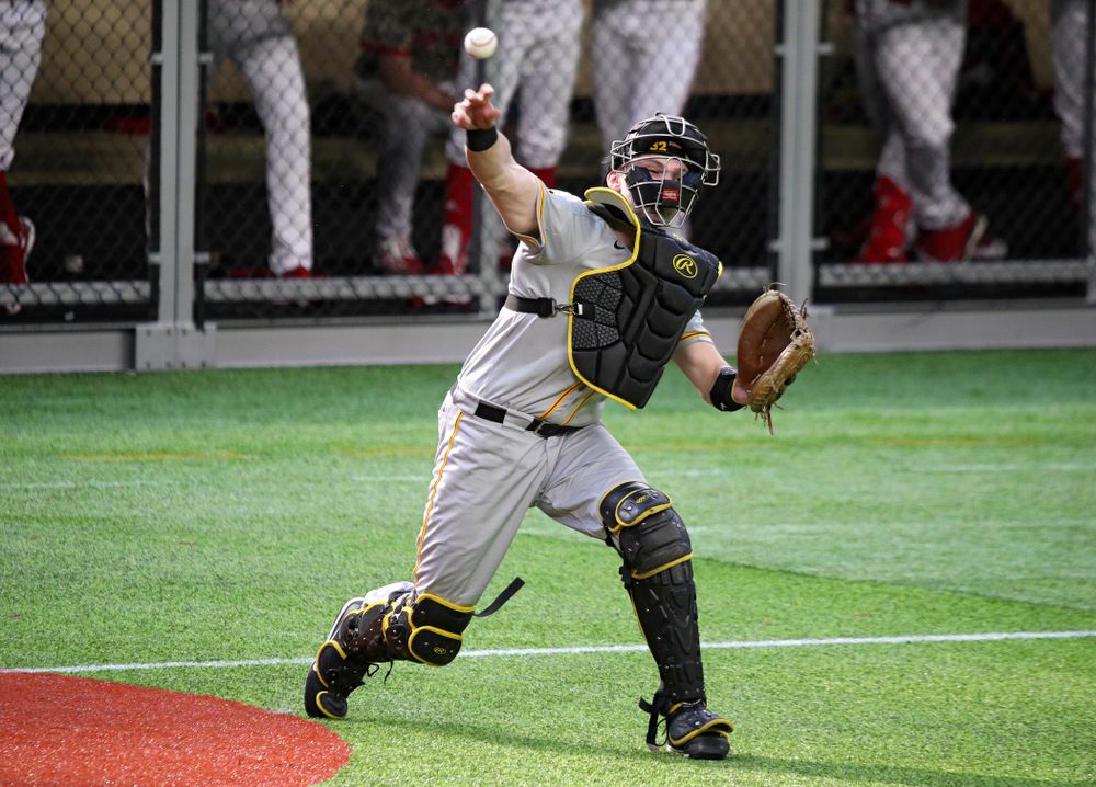 Iowa Hawkeyes catcher Brett McCleary (32) throws during the eighth inning of their CambriaCollegeClassic game at U.S. Bank Stadium in Minneapolis, Minn. on Friday, February 28, 2020. (Stephen Mally/hawkeyesports.com)