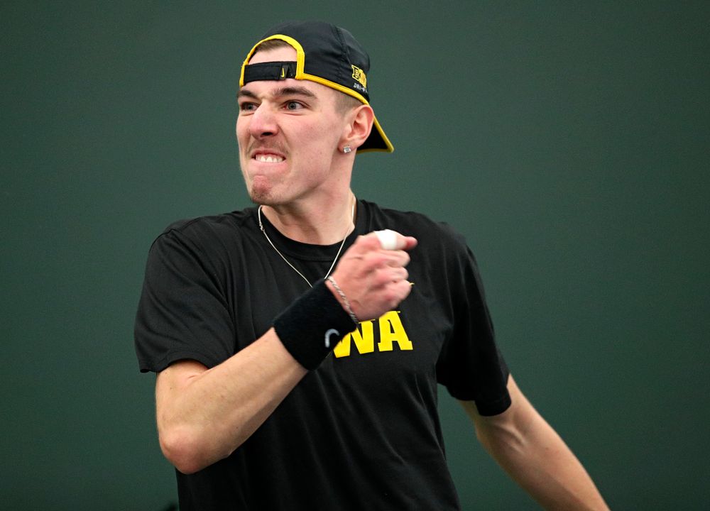 Iowa’s Nikita Snezhko celebrates a point during his doubles match at the Hawkeye Tennis and Recreation Complex in Iowa City on Friday, February 14, 2020. (Stephen Mally/hawkeyesports.com)
