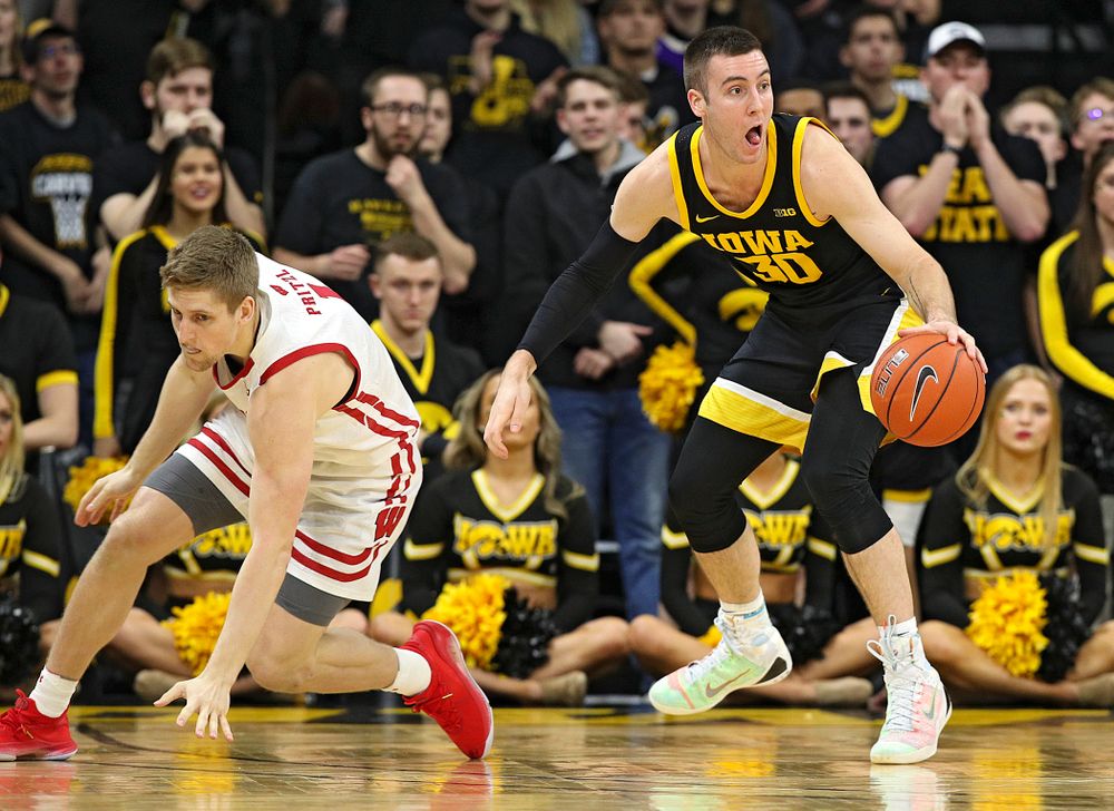 Iowa Hawkeyes guard Connor McCaffery (30) steals the ball away during the second half of their game at Carver-Hawkeye Arena in Iowa City on Monday, January 27, 2020. (Stephen Mally/hawkeyesports.com)