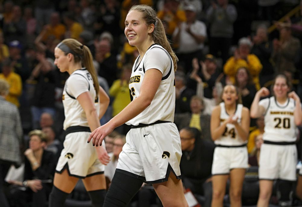 Iowa Hawkeyes guard Kathleen Doyle (22) smiles after making a basket while being fouled during the fourth quarter of their game at Carver-Hawkeye Arena in Iowa City on Sunday, January 26, 2020. (Stephen Mally/hawkeyesports.com)