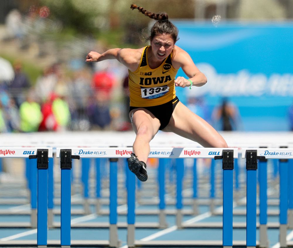 Iowa's Jenny Kimbro runs the women's 100 meter hurdles event during the second day of the Drake Relays at Drake Stadium in Des Moines on Friday, Apr. 26, 2019. (Stephen Mally/hawkeyesports.com)
