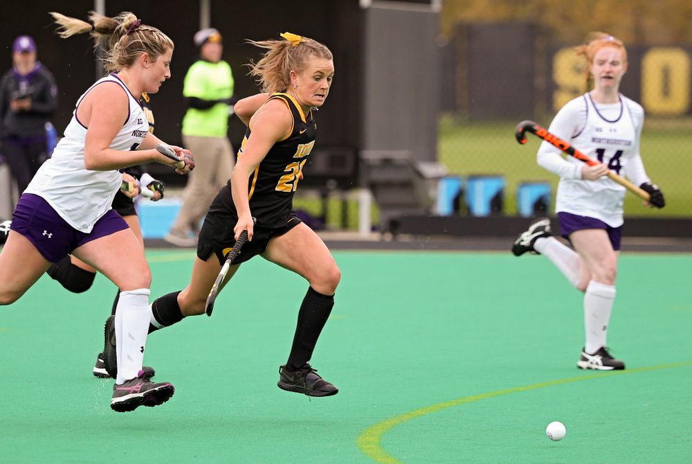 Iowa’s Maddy Murphy (26) runs down the ball before scoring a goal during the fourth quarter of their game at Grant Field in Iowa City on Saturday, Oct 26, 2019. (Stephen Mally/hawkeyesports.com)