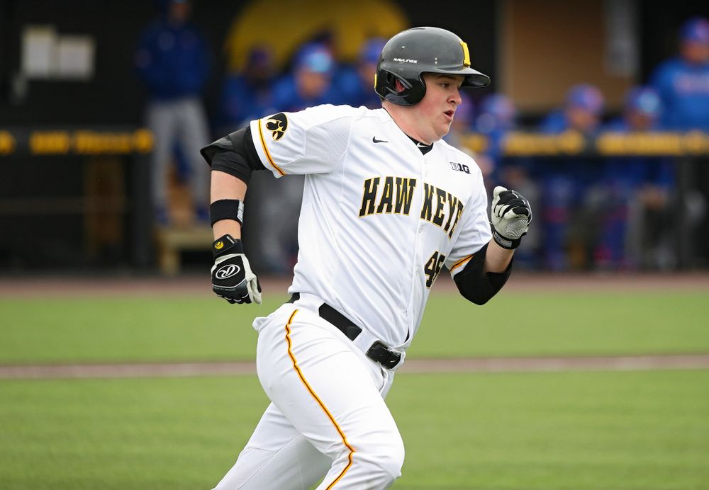 Iowa first baseman Peyton Williams (45) runs after hitting a double during the first inning of their college baseball game at Duane Banks Field in Iowa City on Wednesday, March 11, 2020. (Stephen Mally/hawkeyesports.com)