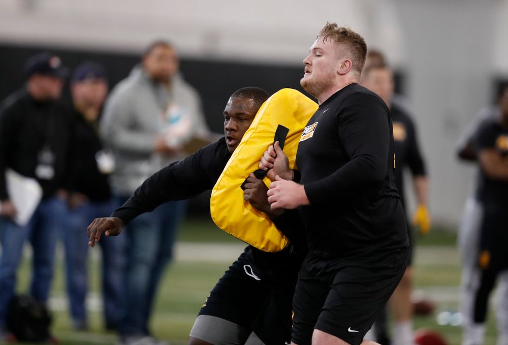 Iowa Hawkeyes offensive lineman James Daniels (78) and offensive lineman Sean Welsh (79) during the team's annual pro day Monday, March 26, 2018 at the Hansen Football Performance Center. (Brian Ray/hawkeyesports.com)