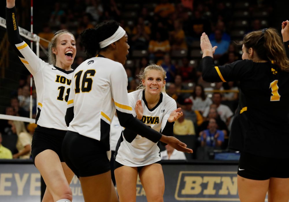 Iowa Hawkeyes middle blocker Hannah Clayton (18) and right side hitter Reghan Coyle (8) against Eastern Illinois Sunday, September 9, 2018 at Carver-Hawkeye Arena. (Brian Ray/hawkeyesports.com)